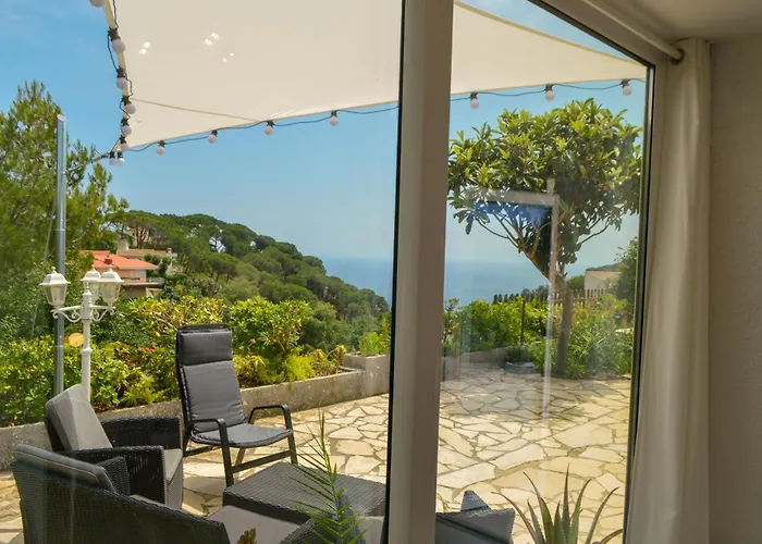 Villa con el parking 24 privado en la playa